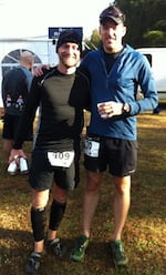 Two guys posing after trail race