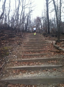 runner climbs stairs