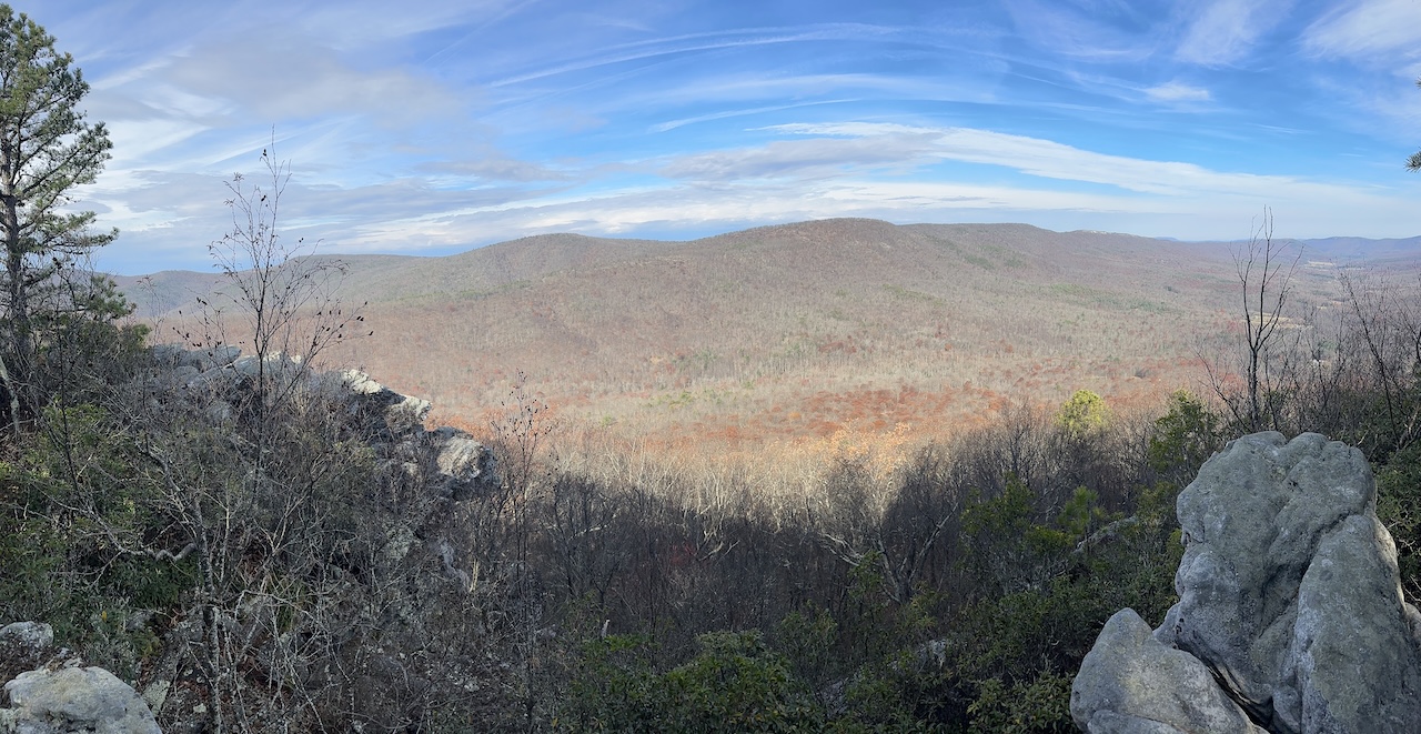 a valley from atop a rocky outcropping